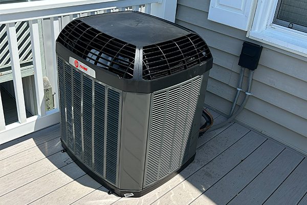 ac-unit-2 AC unit outside on a deck